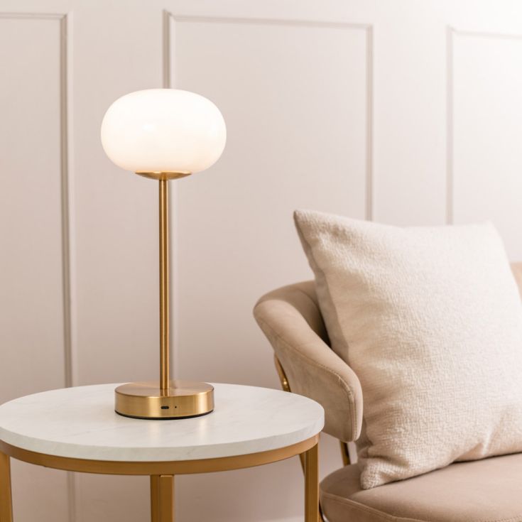 Emmy Rechargeable LED Table Lamp in Antique Brass With Opal Glass Bubble Shade.