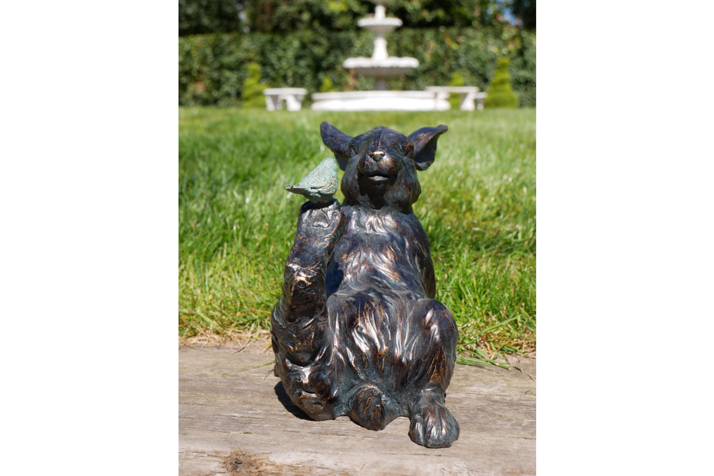 Rabbit and Bird Figurine