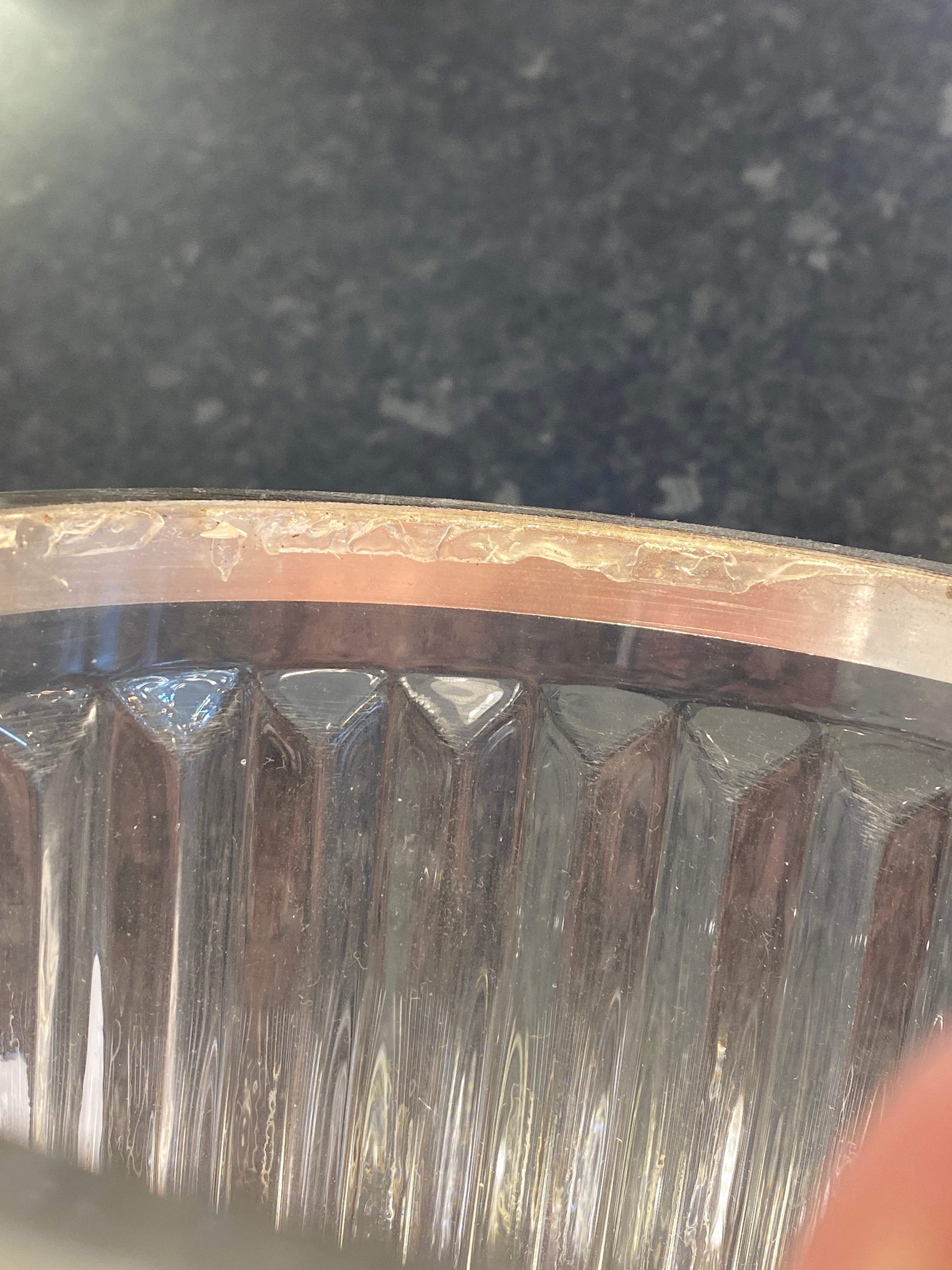 Close-up of a metal gear on a dark background