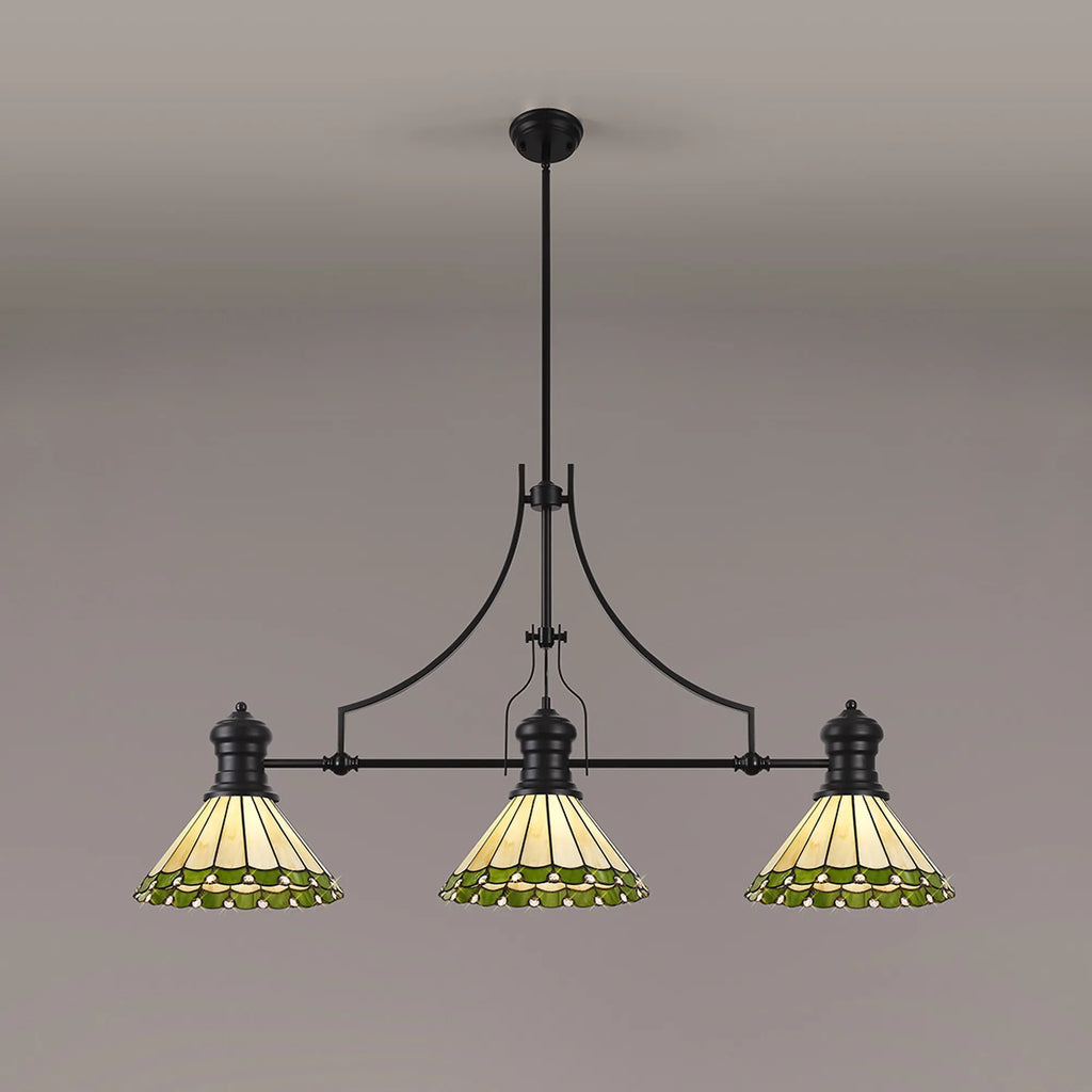 Three-light stained glass chandelier with green and yellow shades on a gray background