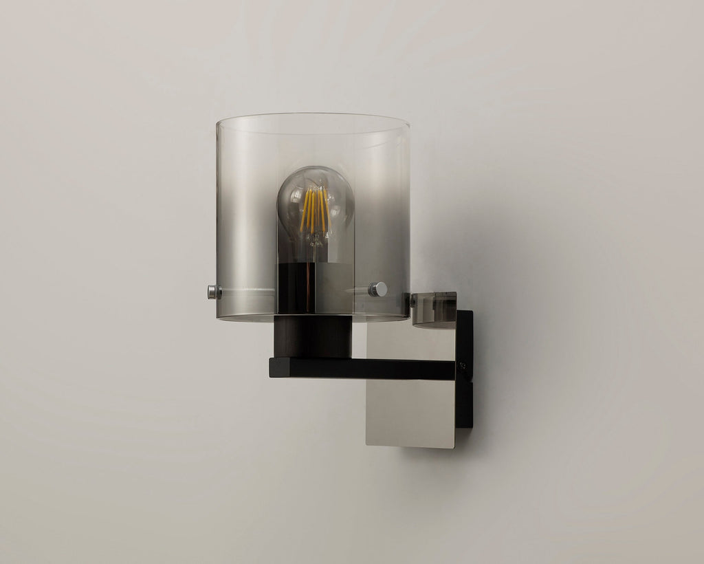 Luminosity Designs - Fae Black Framed Switched Wall Light With Tubular Glass. 1x E27 - Luminosity Designs Ltd