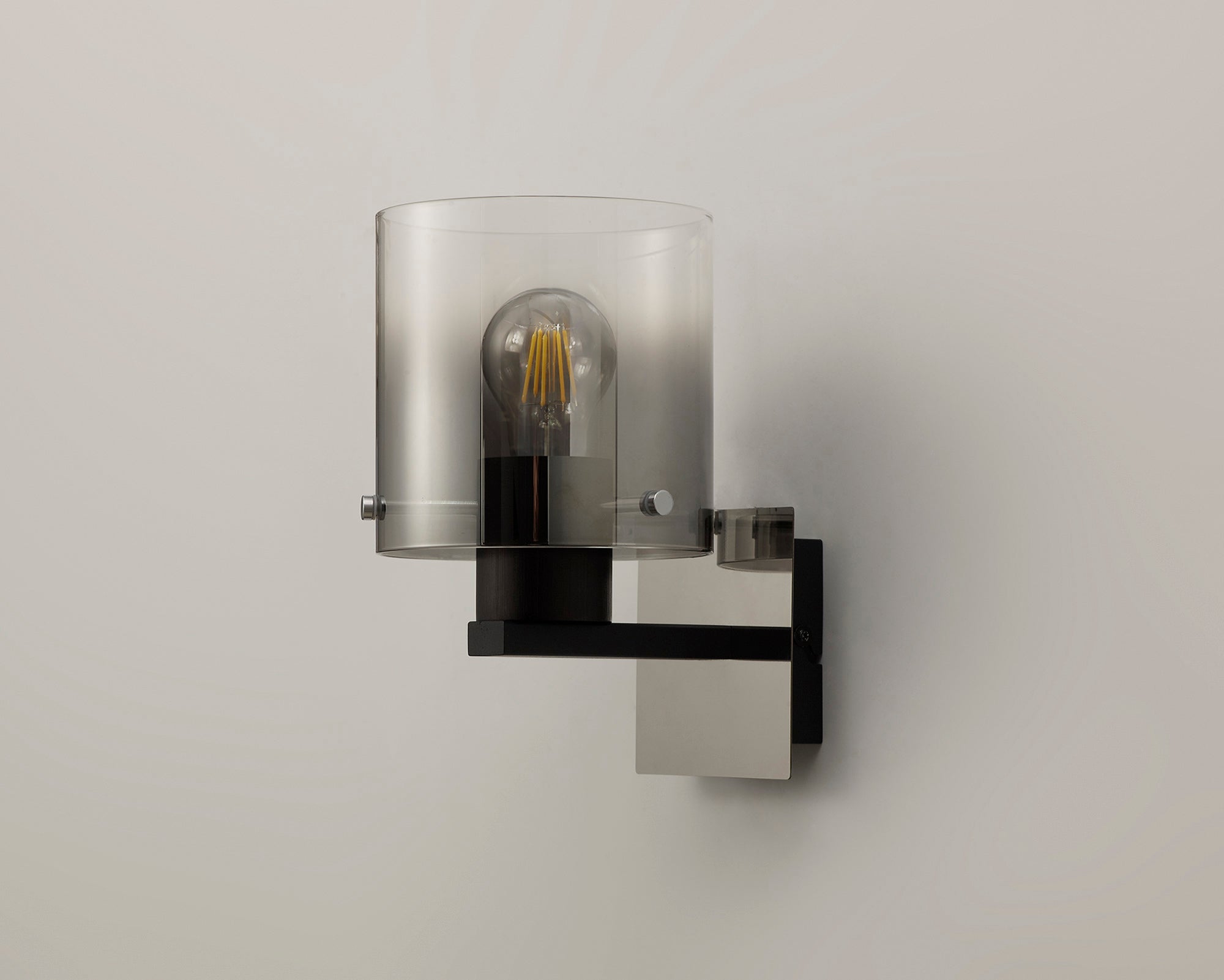 Luminosity Designs - Fae Black Framed Switched Wall Light With Tubular Glass. 1x E27 - Luminosity Designs Ltd