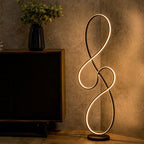 LSE - Infinity LED Matte Black Swirl Floor Lamp - Luminosity Designs Ltd